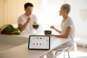 Digital tablet with running e-commerce website with grocery market