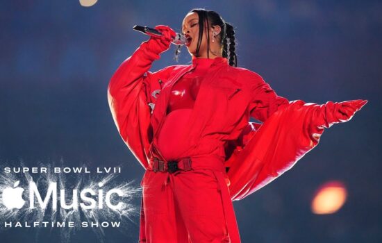 Rihanna signing at the Halftime Show.