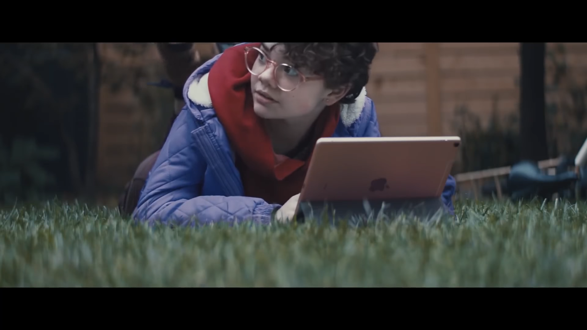 Frame from Apple's "What's a Computer" ad where a girl is using an iPad Pro as her daily driver.