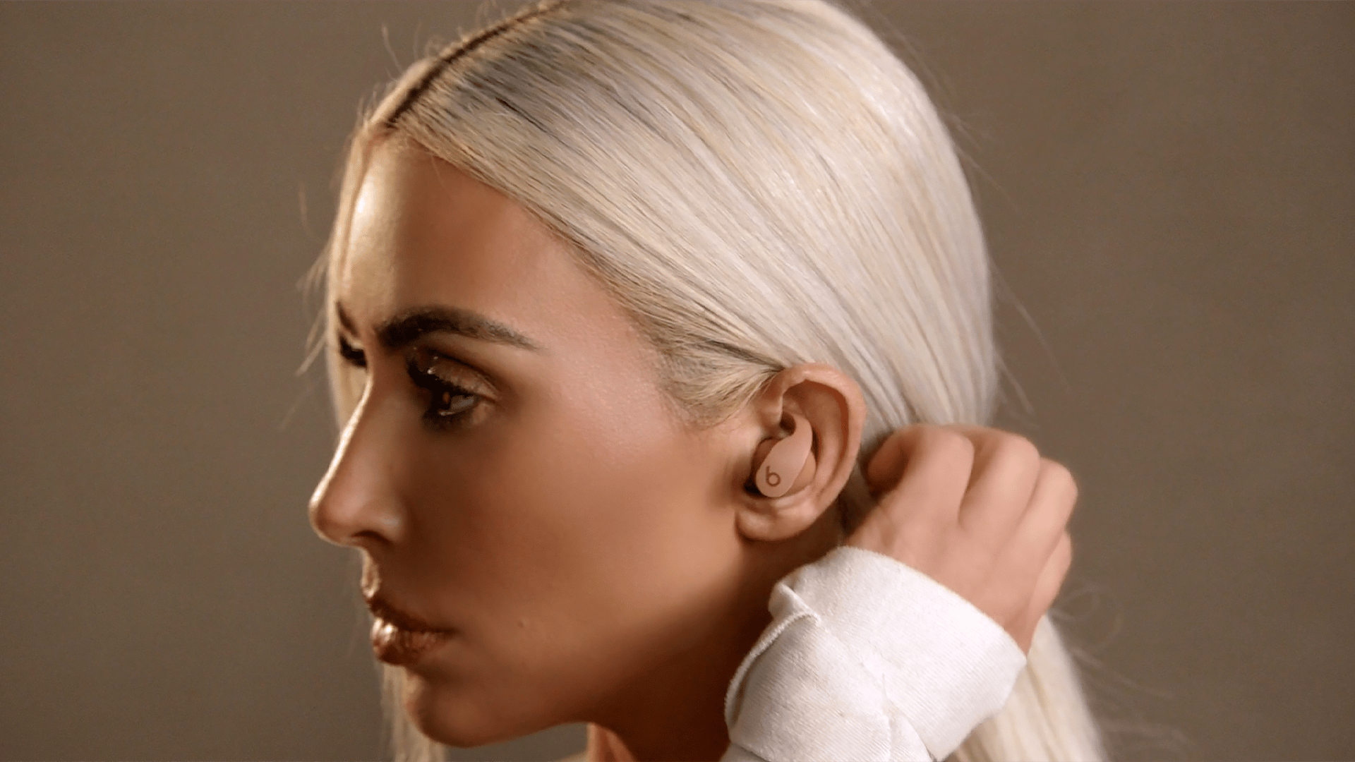 Kim K wearing Beats Fit Pro Collection