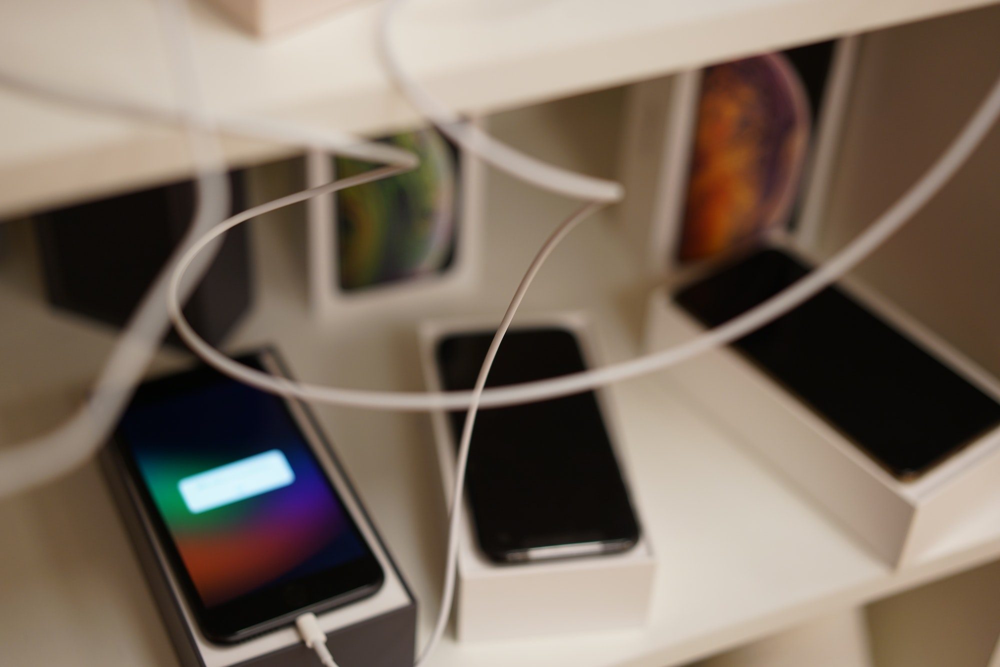 3 iPhones Charging