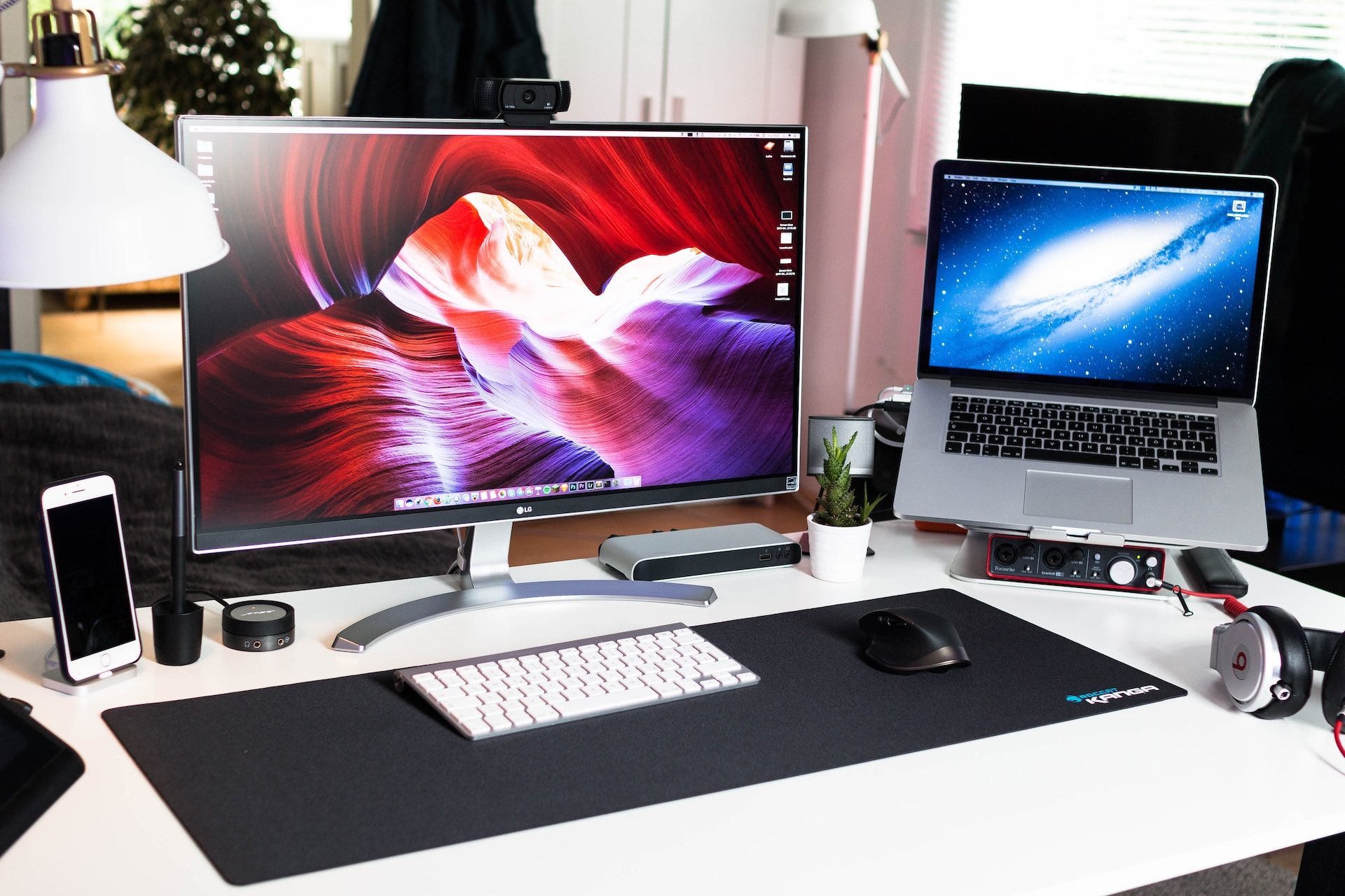 Mac setup with monitor and iPhone