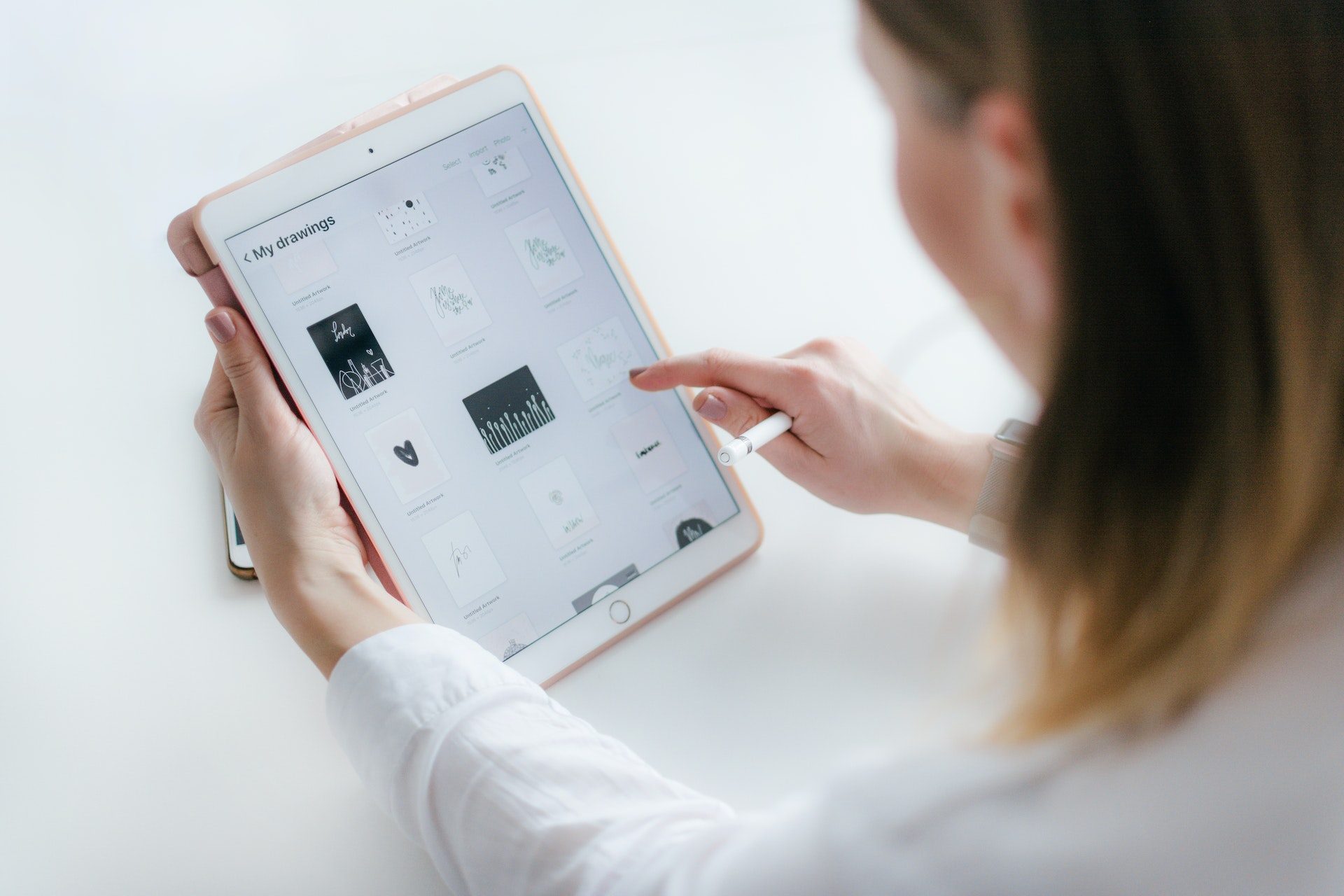 Woman holding iPad