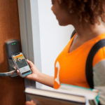 Apple brings student IDs to iPhone and Apple Watch student unlocking door with iPhone 081319 carousel