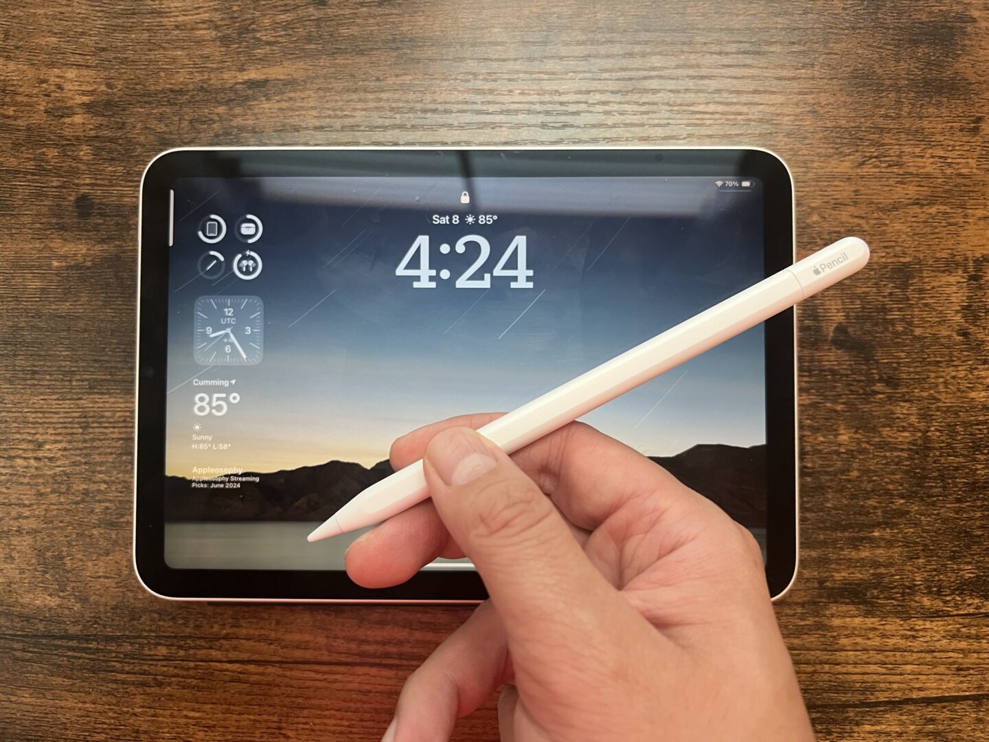 Apple Pencil (USB-C) in front of iPad mini (6th generation)